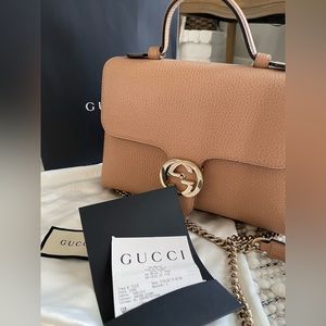 Gucci Dollar Interlocking GG purse